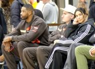 Kim and Triatian were spotted on the sidelines. (Image Credit: London Entertainment / SplashNews.com)